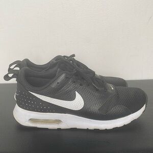 Black and white Nike air running shoes